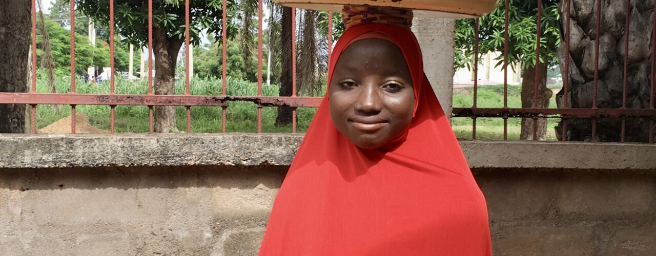 Benue Nigerian girl selling groundnuts