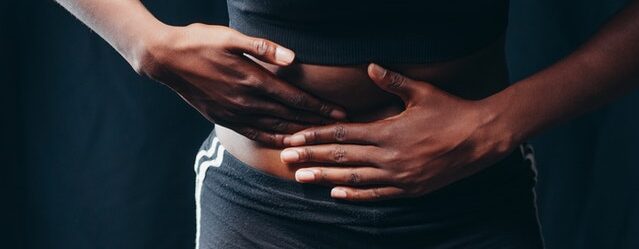 woman with tummy pain